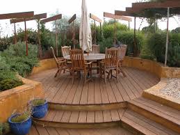 A seating area surrounded by greenery the sunken outdoor seating area at a palos verdes, california, home provides a warm refuge with or without a fire, as even a small amount of sunlight is. Curvilinear Garden Circular Seating Area Contemporary Garden Sussex By Mark Laurence Design Houzz Uk