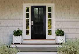 The opaque glazed sidelights reinforce privacy and at the same time enhance the elegance of the door's neutral finish. Black Front Door Ideas To Up Your Curb Appeal Pella Windows Doors