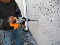 Stucco applied to retaining wall an idea for those who have a walk out basement with block retaining concrete block walls cinder we smooth stucco d this cinder block wall 2 coats of primer and then applied 5 coats of modern masters metallic cinder block walls backyard outdoor. Stucco Over Painted Block Brick