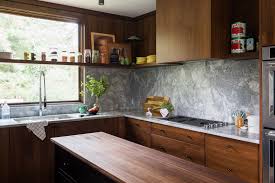 A Mid Century Kitchen Gets A Modern And Moody Makeover Architectural Digest