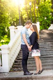 Love is a ripe plum growing on a purple tree. Beautiful Romantic Couple In Love Posing On Stairs At Park At Stock Photo Picture And Royalty Free Image Image 41603172