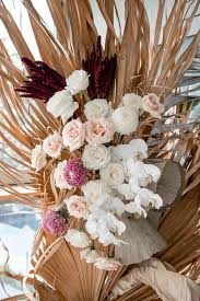 Use a neutral, earthy tone as your base color palette. Natural Boho Beach Wedding Inspiration
