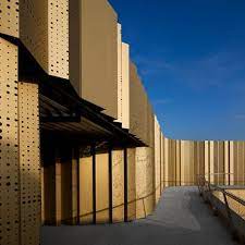 Basque Culinary Center By Vaumm San Sebastian Spain The Golden Facades Are Made Up Of Perforated Met Architecture Details Architecture Multi Storey Building