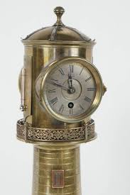 Our lighthouse clock features a nautical theme dial, large to read numbers and an antique, aged look. Lighthouse Clock 1 For Sale On 1stdibs