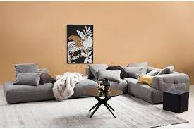 A Stand Out Tan Resene Gold Coast Walls Gives This Living Room A Sunny And Vibrant Look And Allows The Gre Tan Walls Living Room Tan Walls Gold Living Room
