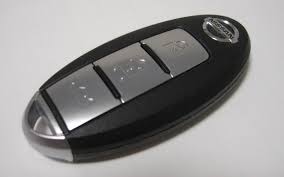 You will need to slide the locking tab with your thumb and pull out the metal key. Smart Key Wikipedia