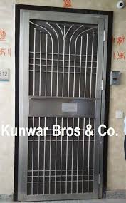 Front double iron door design. Grill Gate Design For Main Door India Novocom Top