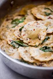 Stir the flour and water with a wooden spoon until the dough forms a ball. Easy Date Night Creamy Tuscan Ravioli Recipe Little Spice Jar