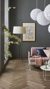 Wooden Patterns In Warm Living Room In 2020 Engineered Wood Floors Living Room Wood Floor Herringbone Wood Floor