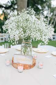 A White And Pink Wedding With Baby S Breath For Days Wood Centerpieces Wedding Beach Wedding Centerpieces Rustic Wedding Centerpieces