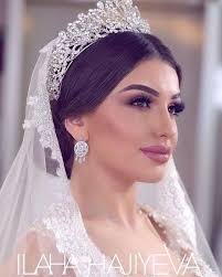 Half updo bangs bridal hairstyle with veil and tiara half updo hairstyle with veil and tiara. Bridal Hairstyles With Tiaras Arabia Weddings