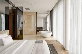 Roomers hotel baden baden embraces a courtyard, extending the activities from inside to outside and providing a sense of continuity with the adjacent gardens and their lush vegetation. Roomers Baden Baden Unycu Hotels