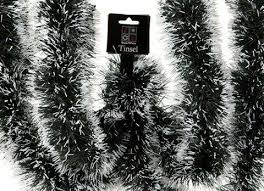 The black tinsel offered on sale can be fully customized to your event or party theme with a myriad of options available. Snowy Tipped Christmas Tinsel Dark Green Black Mix With White Tips 3m X 10cm For Sale Online Ebay