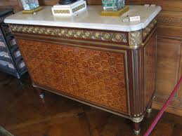 Gilt stenciling was popular as was the use of ormolu (a type of brass made to imitate gold). French Furniture Wikipedia