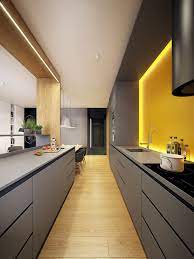 Using 4x16 white ceramic tiles gave this traditional kitchen a modern clean pop. Modern Gray Kitchen Cabinets Beat Monotony With Style