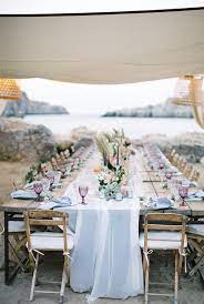 An Elegant Bohemian Wedding On The Beach At Tambakio In Greece Beach Wedding Decorations Reception Beach Wedding Tables Beach Wedding Decorations