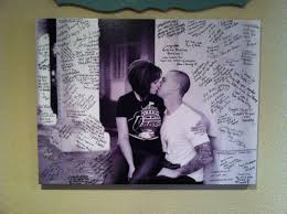 Eric And My Wedding Guest Book Our Engagement Picture Blown Up On Canvas And Everyones Well Wis Canvas Guest Book Wedding Guest Book Canvas Wedding Guest Book