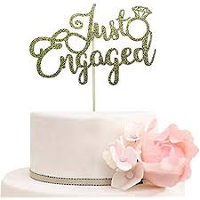 A good number of them are designed with engagement rings with ribbons. Omkraft Designer Engagement Cake Topper With Different Colour Options Available Amazon In Home Kitchen