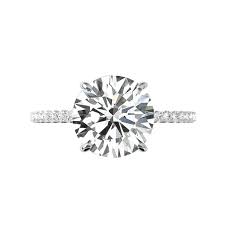 Shop this engagement ring with a rare grey moissanite & sparkling diamonds along the precious metal body. 5 Carat Round Harro Moissanite Hidden Halo Engagement Ring Raven Fine Jewelers