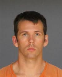 Man arraigned in police officer slaying