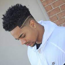 This taper fade black men haircut is styled with an afro on the top, creating a box shape. Pin On Haircut Ideas