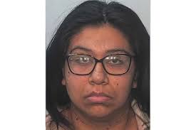 Court documents show Kelley Mann Howard is accused of slapping a  one-year-old multiple times and yanking a child by the leg to get them out  of a crib. t.ly/Q3DaO