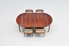 Nago is a chubby black cat with deep red eyes, a white muzzle and pink cheeks similar to kirby and kara. Torbjorn Afdal Rosewood Dining Table Nejestranda Norway 1960 Massmoderndesign