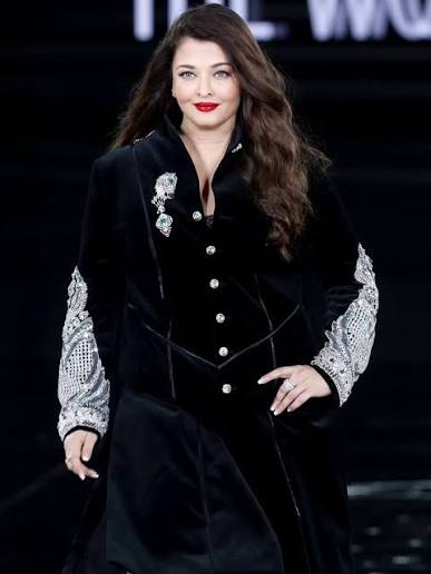 Trust Aishwarya Rai Bachchan to make Paris pause. The icon walked the Le  Défilé L'Oréal Paris Spring 2026 runway in a bespoke Manish Malhotra  creation—a diamond-studded sherwani paired with a nau lakha