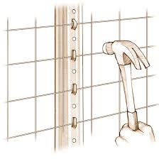 3) thread the wire between the two prongs of the plastic hook. Mesh Fencing Installation Basics Diy Mother Earth News