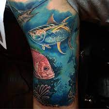 The crab is inked surrounded with watery waves, along with black lines making geometric shapes. 135 Prettiest Ocean Tattoo Ideas Meaning History Type Average Cost