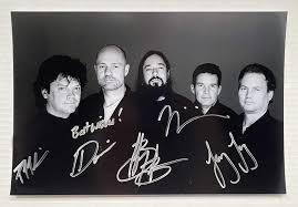 Recorded before gord downie's cancer diagnosis and produced by broken social scene's kevin drew and dave hamelin. The Tragically Hip And Gord Downie Signed Autographed Photograph Photo Amazon Ca Industrial Scientific