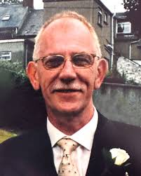 DAVID MULLAN 15th July 2024 peacefully at Altnagelvin Hospital, surrounded  by his loving family. Beloved husband of the late Maria, loving father of  Esther, David and Kevin, a dear father-in-law of Aisling,