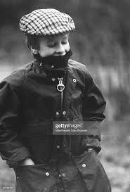 Peter Wears A Tweed Cap And Waterproof Jacket During The Christmas Waterproof Jacket How To Wear Tweed