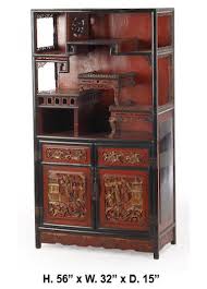The two doors open toa black interior with a shelf. Antique Chinese Red Painted And Lacquered Cabinet At 1stdibs