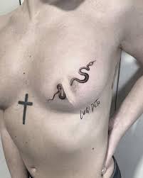 Amazing black tribal snake tattoo stencil. Snake Tattoo On The Breast