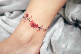 This foot and ankle tattoo with cherry blossom and vine look awesome together. Top 110 Best Cherry Blossom Tattoo Ideas For Women Beautiful Body Art