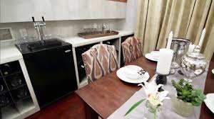 These cabinets can be paneled to blend in with the other kitchen cabinets. Resurfacing Kitchen Cabinets Pictures Ideas From Hgtv Hgtv