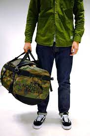The North Face Camp Duffle Camo At Urban Industry Duffle Camo How To Wear