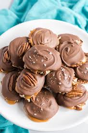 Halved · 24 kraft caramels ; Chocolate Pecan Turtle Clusters Tastes Of Homemade