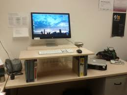 Building a desk doesn't need to be intimidating at all! Diy Standing Desk Erin White