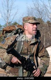 U.S. Army Staff Sgt. Manuel F. Valencia, a platoon sergeant with the 287th  Transportation Company based in Anniston, Ala., completes a seven-mile ruck  march Jan. 24, 2021, as part of the 642nd Regional Support Group Best  Warrior Competition at Fort ...