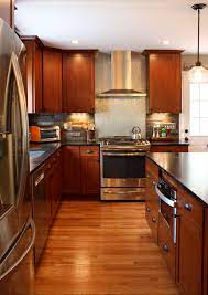 Cherry Cabinets With Soapstone Countertops Stainless Steel Hood Backsplash Kitchen Cabinets Cherry Cabinets Kitchen Kitchen Design