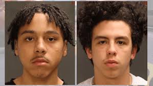 Teenagers charged with shooting at each other in street, nearly wounding  neighbor inside home