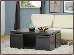 An ottoman is a versatile piece of furniture that can spruce up your living room, add function and tie but keep in mind that an ottoman that is taller than the level of seating can be less comfortable than ottomans come in a variety of styles and shapes. Coffee Table With Stools You Ll Love In 2021 Visualhunt