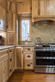 Often hickory cabinets in the kitchen are associated with rustic, country or mediterranean style, but the material has found its place in modern designs! Mullet Cabinet A Rustic Hickory Kitchen With Live Edge Island