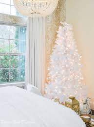 The black and white with red pops of color! White Tinsel Tree Christmas Bedroom Magical Glow Bedroom Christmasbedroom Whitebedroom Christmastree Weihnachten