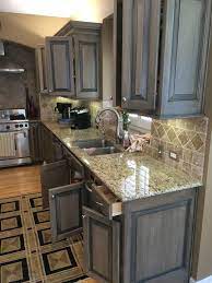 A tan which contains a hint of grey will neutralize the woods undertones, not oppose it. Kitchen Cabinets Blonde Pickled To Medium Gray Contemporary Kitchen Little Rock By Falkner And Co Houzz