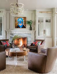 Cozy Transitional Living Room Library With Fireplace And Leather Swivel Chairs Transitional Home Decor Interior Design Interior