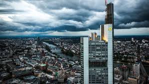 An antenna spire with a signal light on top gives the tower a total height of 300.1 m (985 ft). Commerzbank Takes Spotify As A Role Model