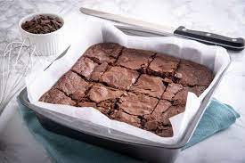 After removing from the oven, place the pan on a wire rack and let cool; How To Remove Brownies From A Pan Without Crumbling Or Breaking Baking Kneads Llc